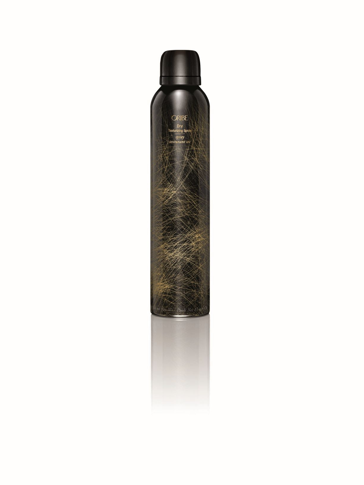 Two bottles of Oribe Dry Texturizing Spray, one larger and one smaller, with a dark label and decorative gold pattern.