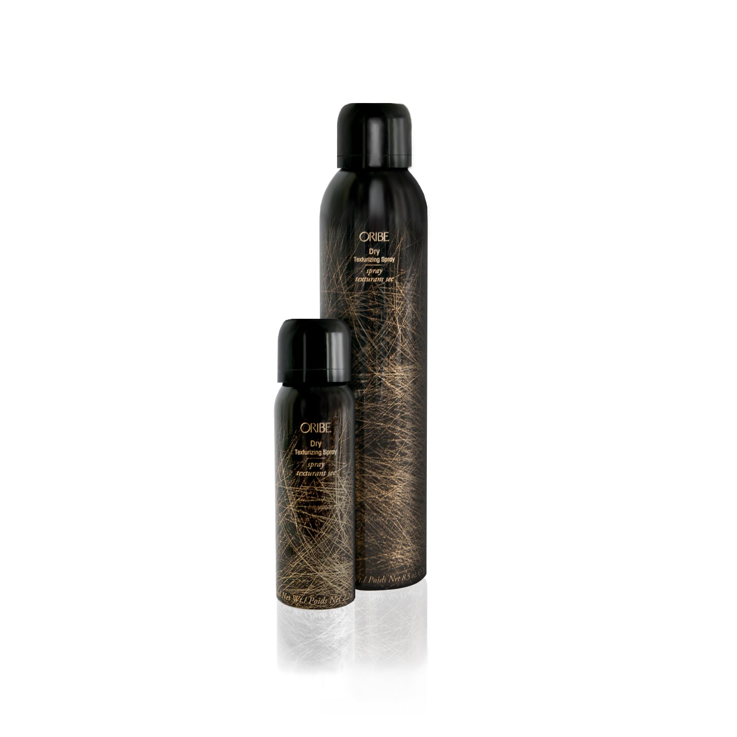 Two bottles of Oribe Dry Texturizing Spray, one larger and one smaller, with a dark label and decorative gold pattern.