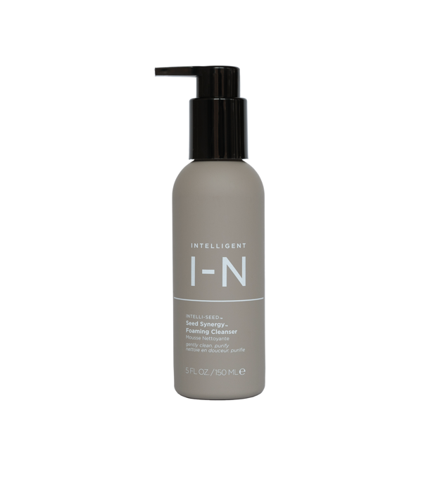 A pump bottle of Intelli-N Seed Synergy Foaming Cleanser with a gray label and black pump.