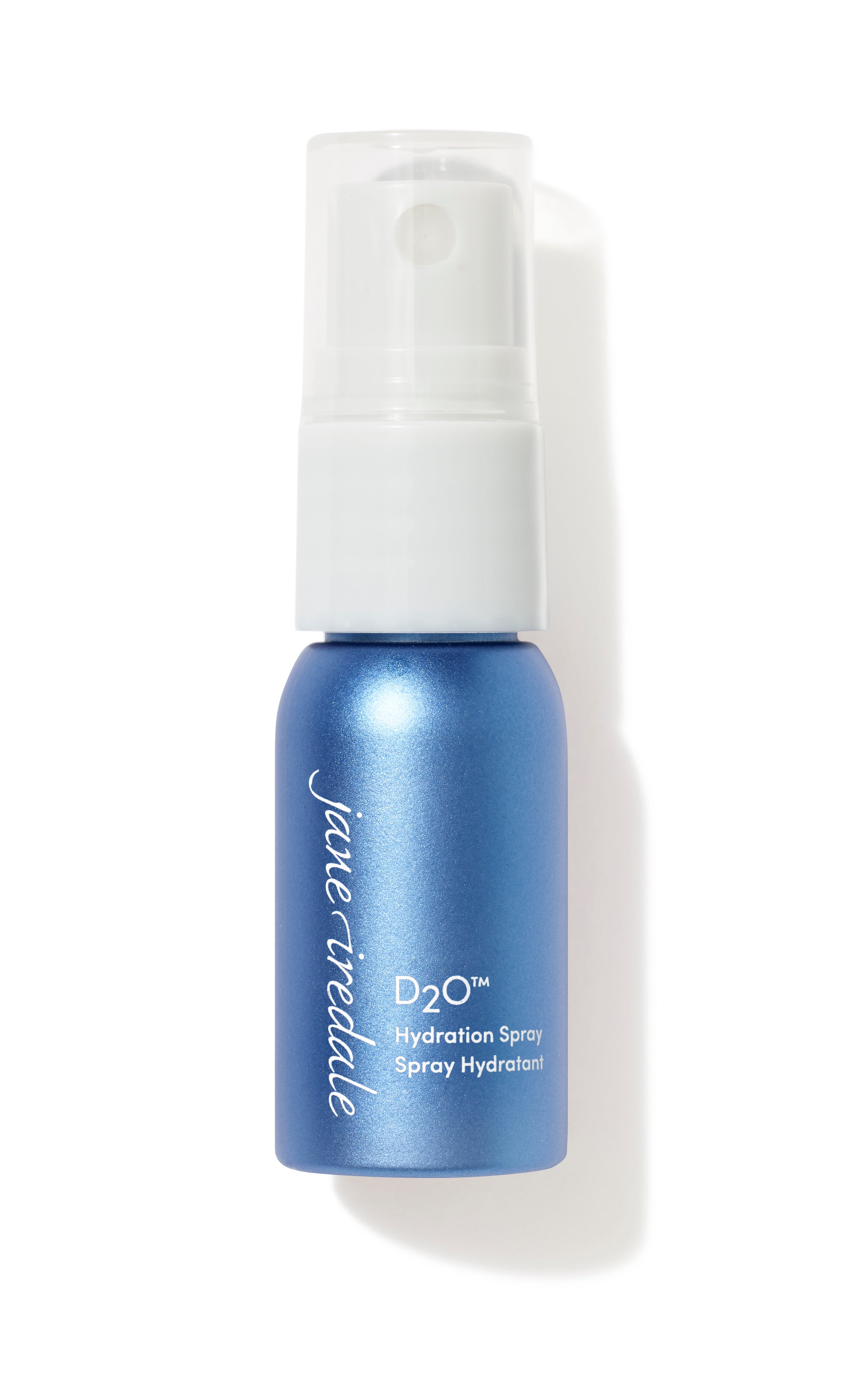 Blue spray bottle with white nozzle on a white background